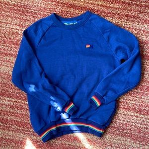 Aviator Nation Blue Crewneck with rainbow trim.